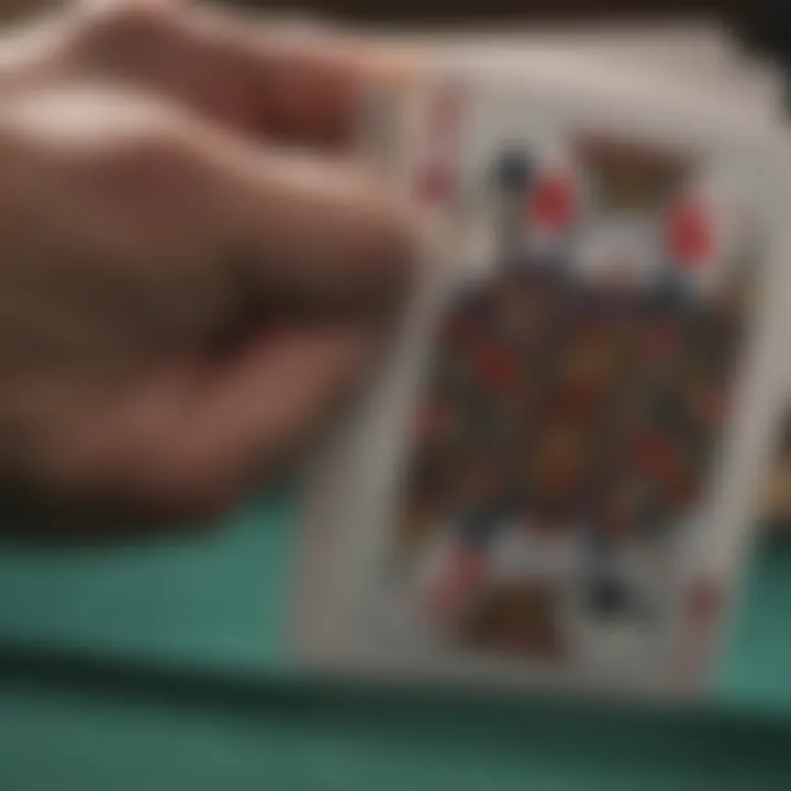 A close-up view of blackjack cards being dealt in a single deck game.